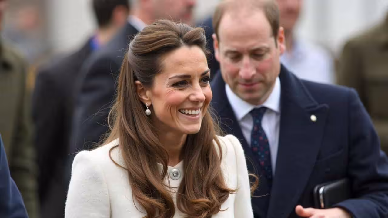 Away from William but accompanied by George, Kate Middleton looks stunning at the Festival of Remembrance
