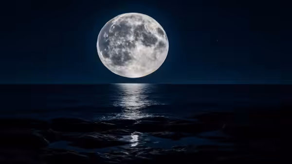 As the Moon slowly drifts away from Earth, it is quietly lengthening our days and gradually softening the planet’s tides